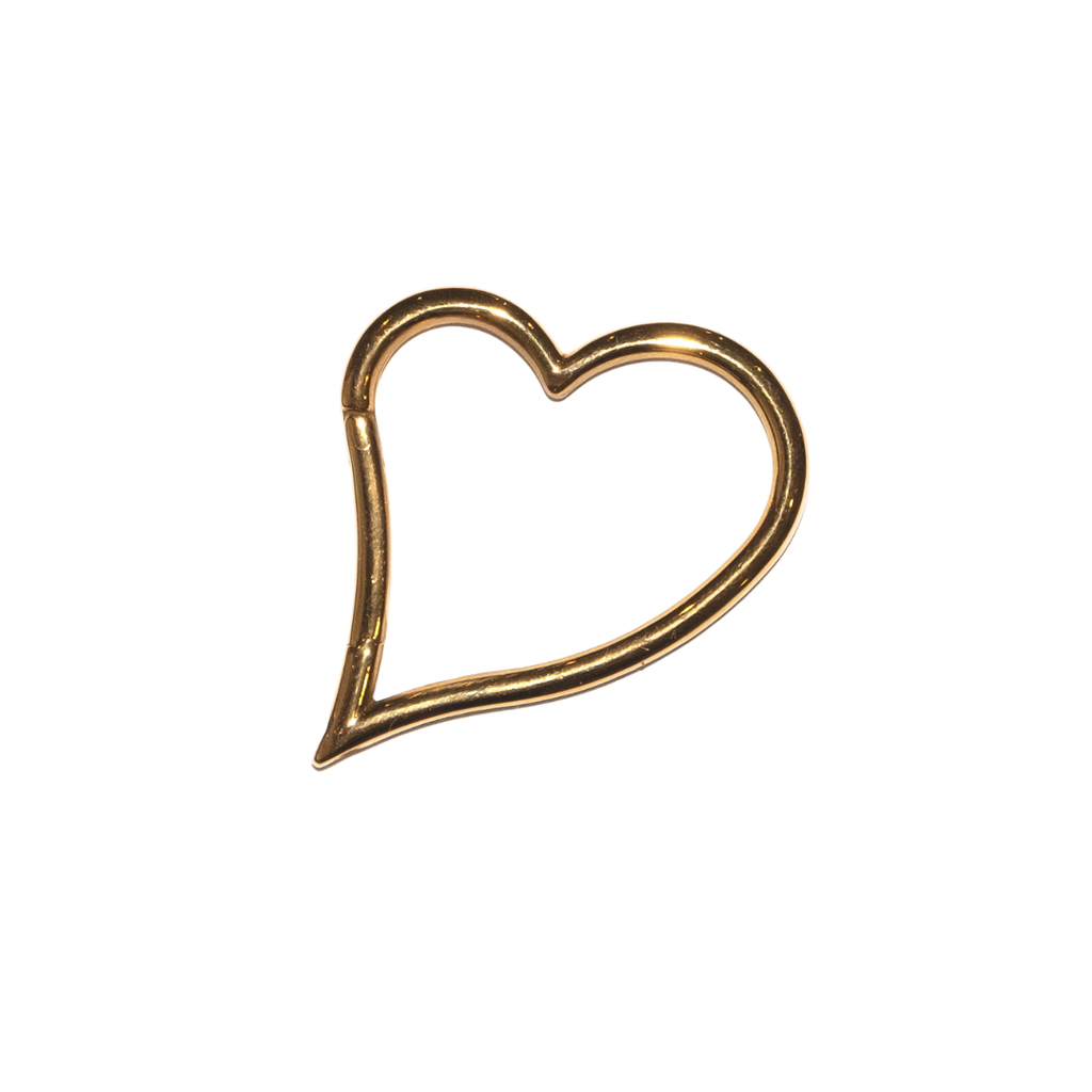 Gold heart-shaped necklace lock on a white background
