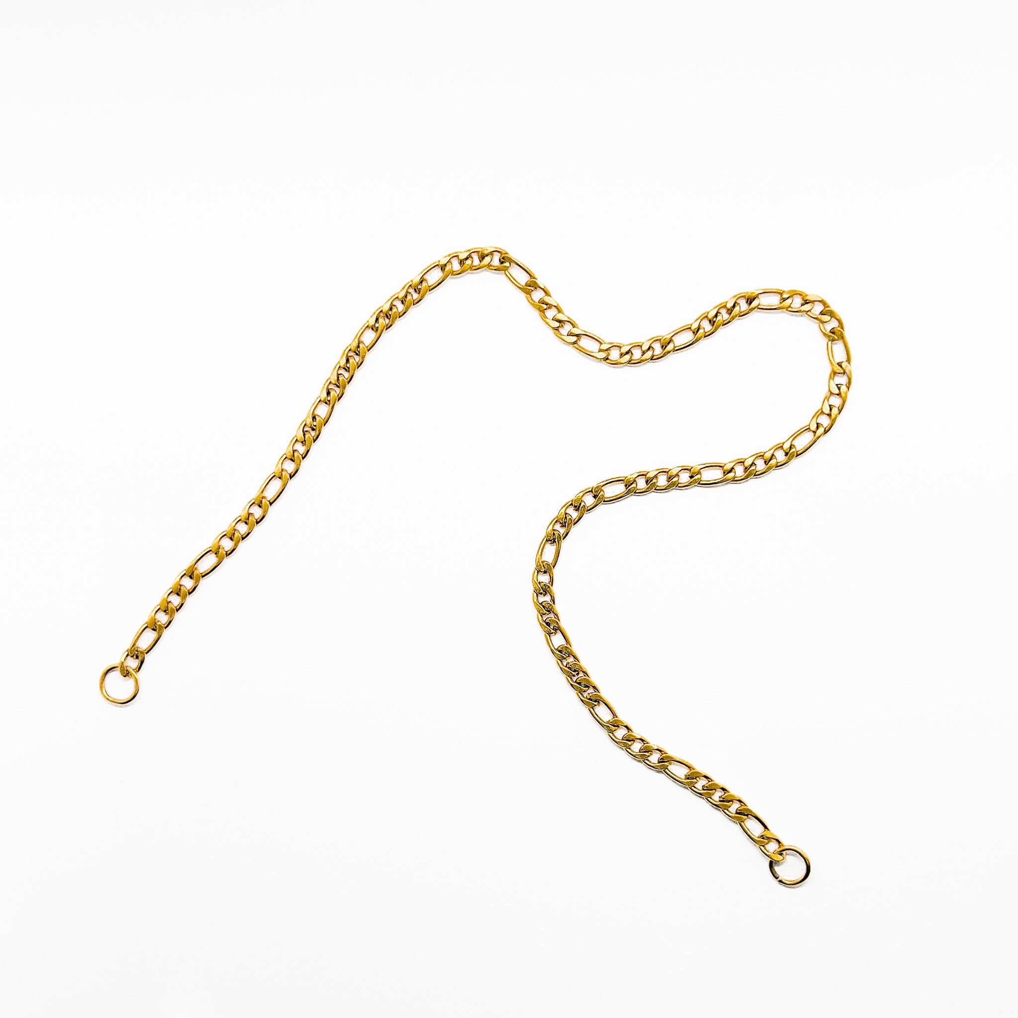 Figaro chain showing distinctive alternating link pattern and premium craftsmanship